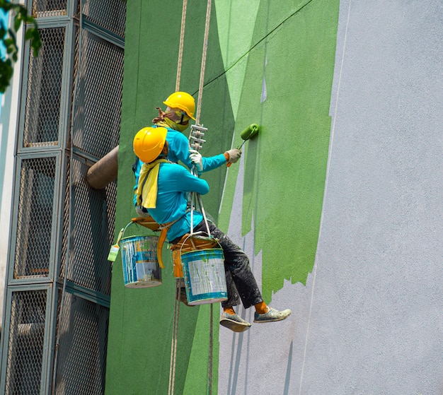 painters-painting-exterior-building_77206-458